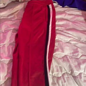 Red track joggers